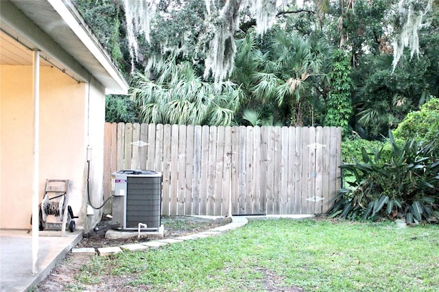 view of yard featuring central AC unit