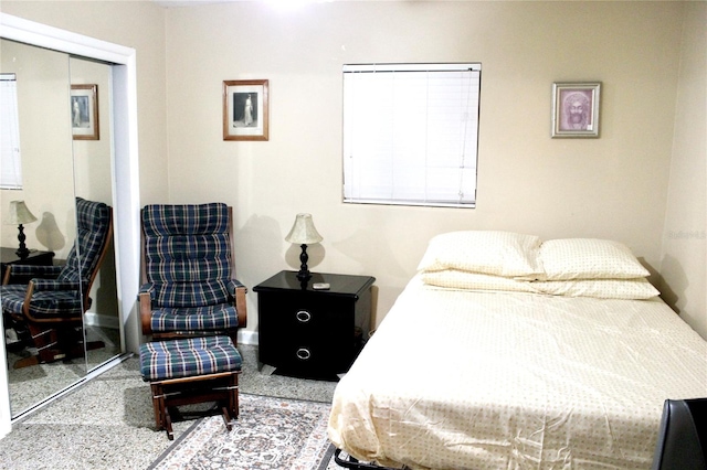 carpeted bedroom with a closet