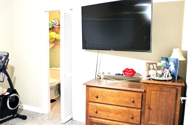 bedroom featuring ensuite bath