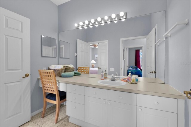 bathroom with vanity and tile patterned floors