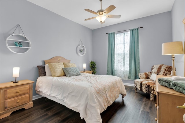 bedroom with ceiling fan and dark wood-type flooring