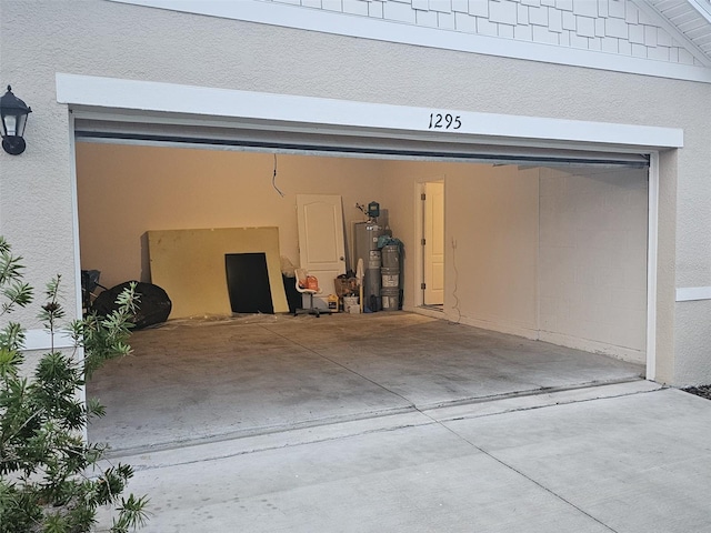 garage featuring water heater