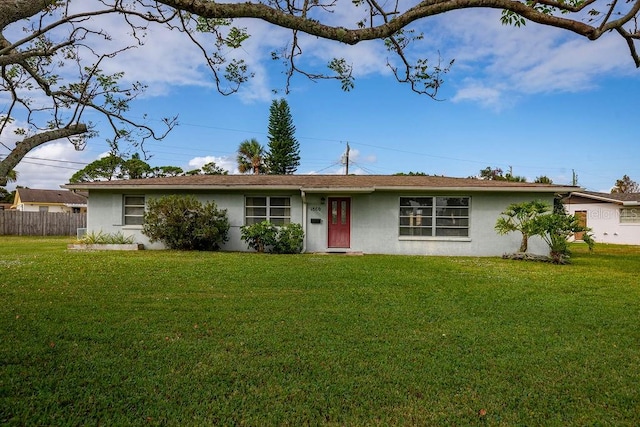 ranch-style house with a front lawn