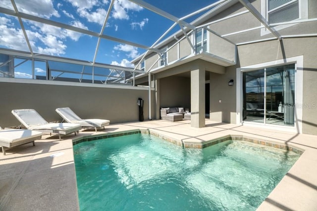 view of swimming pool with an outdoor living space, glass enclosure, and a patio area