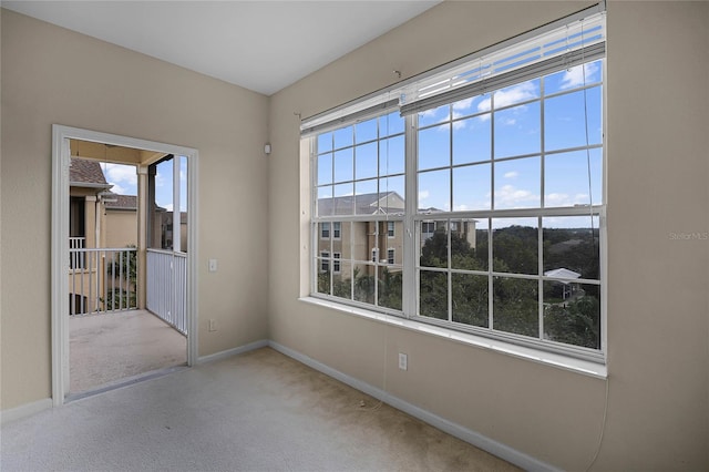 view of carpeted spare room