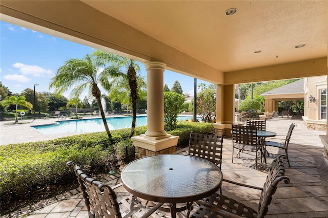 view of patio / terrace with a community pool