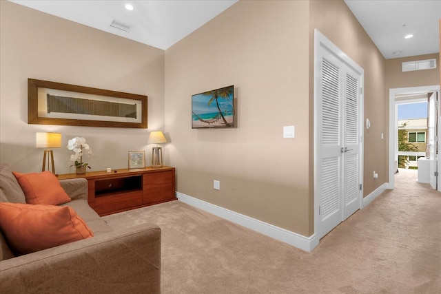 sitting room with light carpet