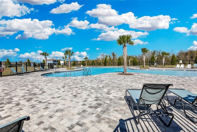 view of pool featuring a patio area