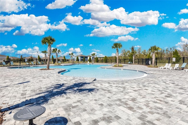 view of pool featuring a patio