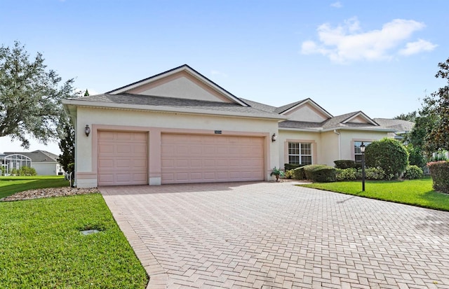 ranch-style home with a garage and a front yard