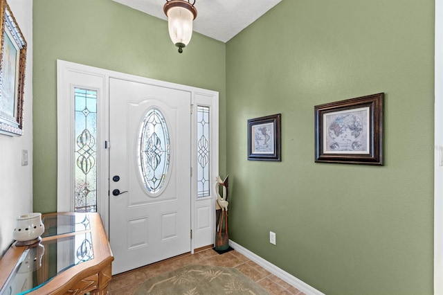 view of tiled entrance foyer