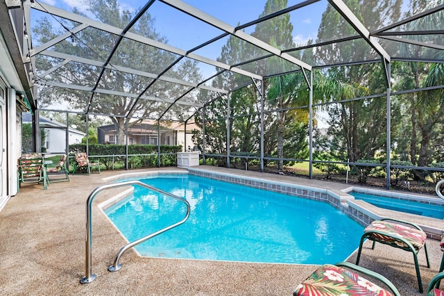 view of pool featuring a lanai and a patio area