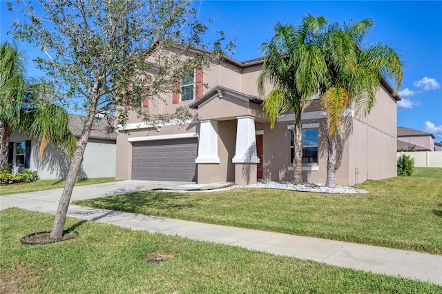 view of front of house with a garage and a front yard