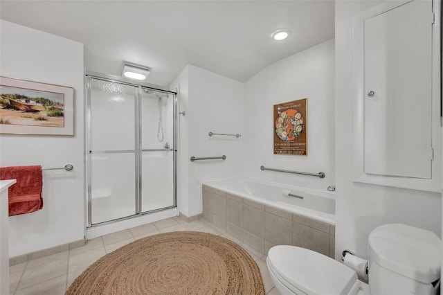 bathroom featuring tile patterned flooring, shower with separate bathtub, and toilet