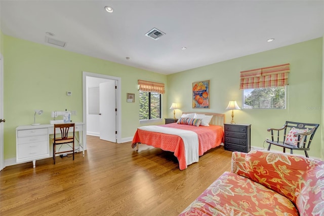 bedroom featuring light hardwood / wood-style floors