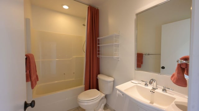 full bathroom with toilet, sink, and shower / bath combination with curtain