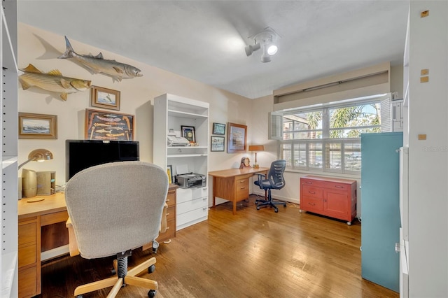 office area with light wood-type flooring