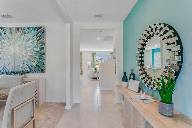 corridor featuring light tile patterned flooring