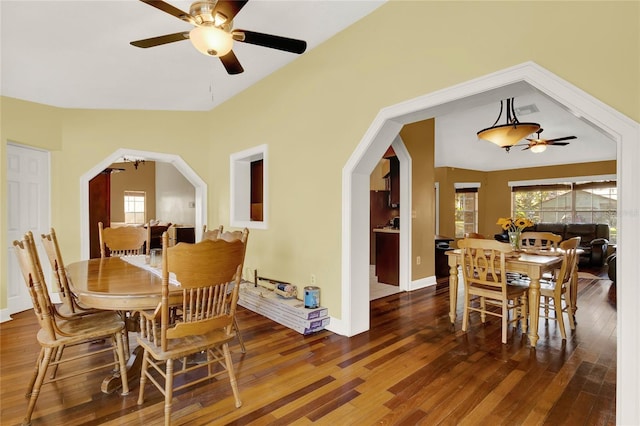 dining space featuring ceiling fan and hardwood / wood-style floors