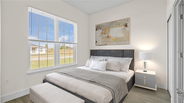 bedroom featuring dark hardwood / wood-style floors