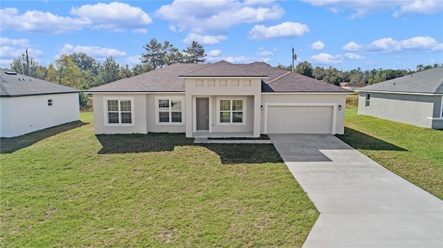 single story home featuring a garage and a front yard