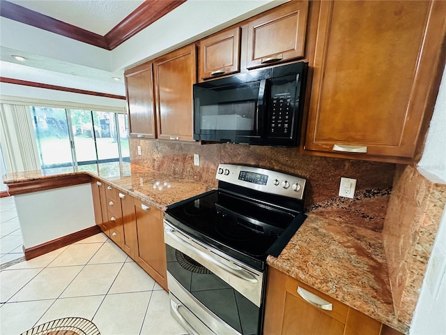 kitchen with tasteful backsplash, stainless steel electric range, light stone counters, crown molding, and light tile patterned floors