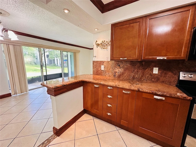 kitchen with light tile patterned flooring, kitchen peninsula, a textured ceiling, range, and lofted ceiling