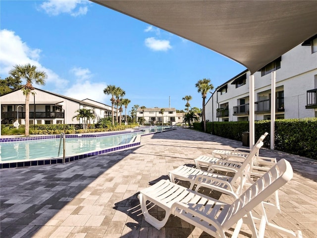 view of pool featuring a patio area