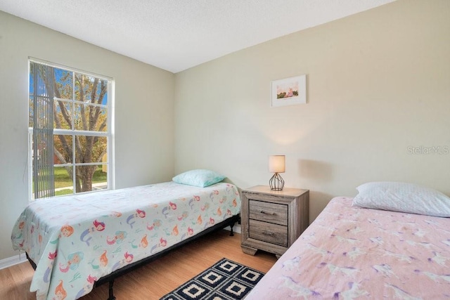 bedroom featuring hardwood / wood-style flooring