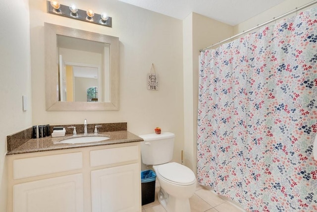 8447 Crystal Cove Loop, Kissimmee, FL 34747 - bathroom with tile patterned flooring, toilet, vanity, and curtained shower