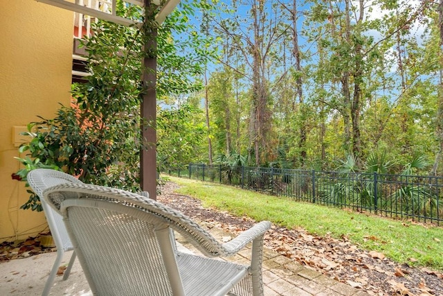 8447 Crystal Cove Loop, Kissimmee, FL 34747 - view of patio / terrace featuring fence