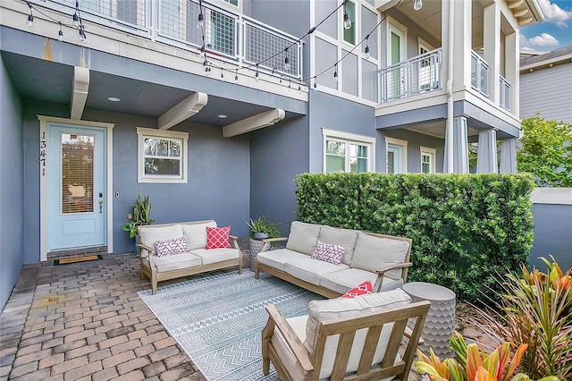 view of patio / terrace featuring a balcony and an outdoor hangout area