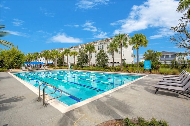 view of pool featuring a patio area