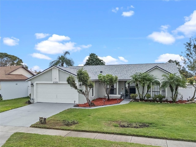 single story home with a garage and a front yard