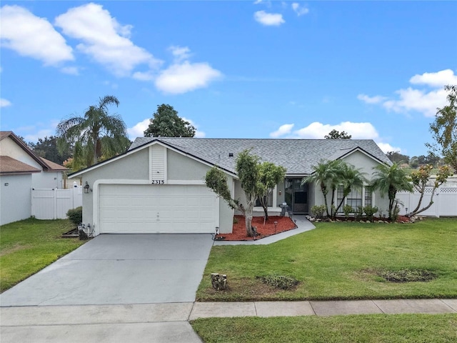 ranch-style home featuring a garage and a front lawn