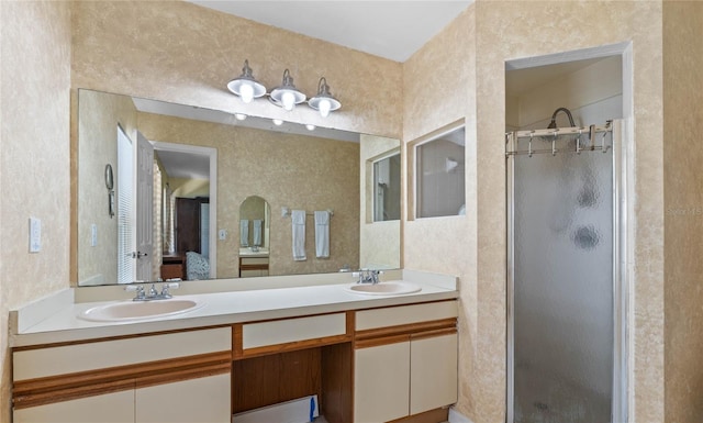 bathroom with vanity and an enclosed shower