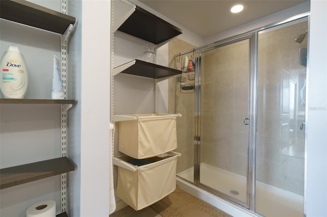 bathroom featuring an enclosed shower