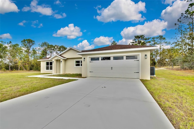 view of front of property with a front lawn and a garage