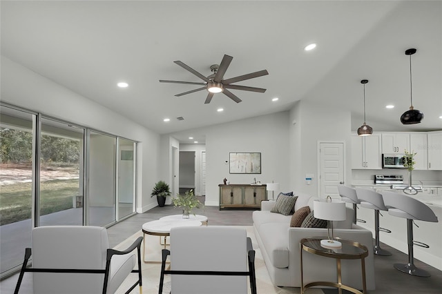 living room featuring ceiling fan and high vaulted ceiling