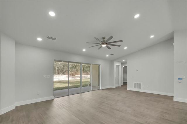 unfurnished room with ceiling fan and wood-type flooring