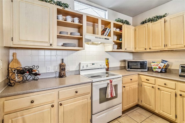 kitchen featuring white electric range oven, light brown cabinetry, light tile patterned flooring, and range hood