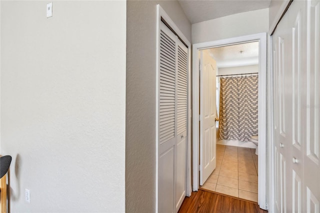 hall with light wood-type flooring