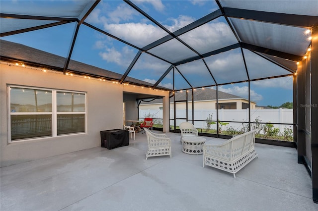 view of patio with a lanai