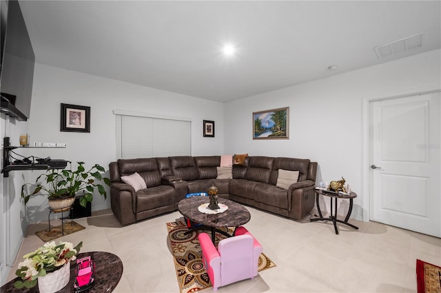 living room featuring light tile patterned flooring