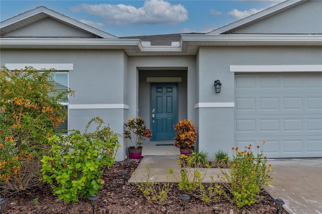 entrance to property with a garage