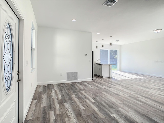 1543 Mackinaw St, North Port, FL 34286 - interior space with visible vents, light wood-style flooring, baseboards, and recessed lighting