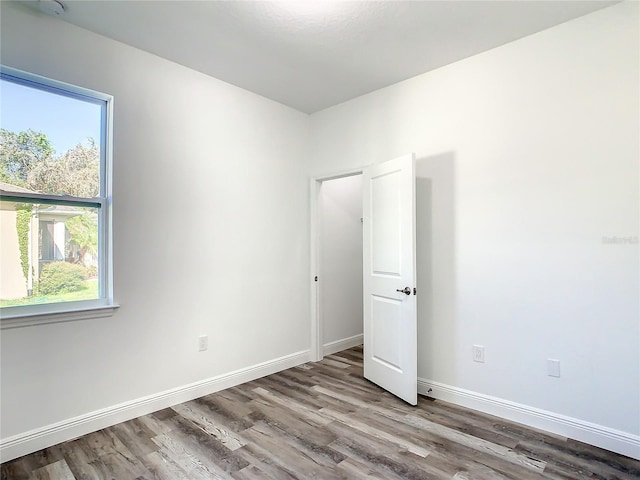 spare room featuring light hardwood / wood-style flooring