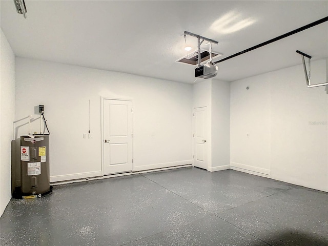 garage featuring a garage door opener and electric water heater