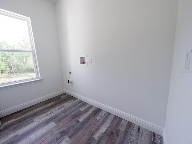 laundry area with hookup for a washing machine, electric dryer hookup, and dark hardwood / wood-style floors