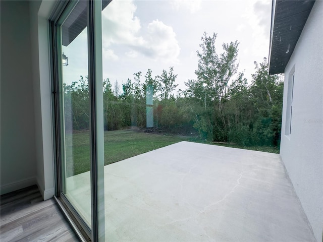 1543 Mackinaw St, North Port, FL 34286 - entryway featuring plenty of natural light and wood finished floors
